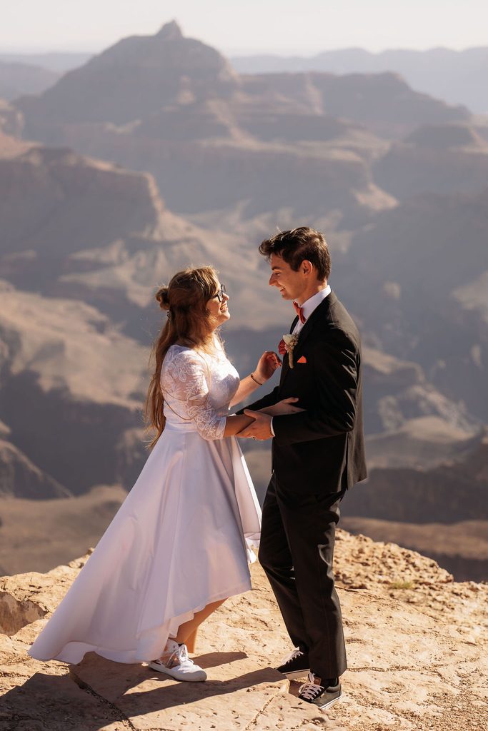 couple embraces at elopement