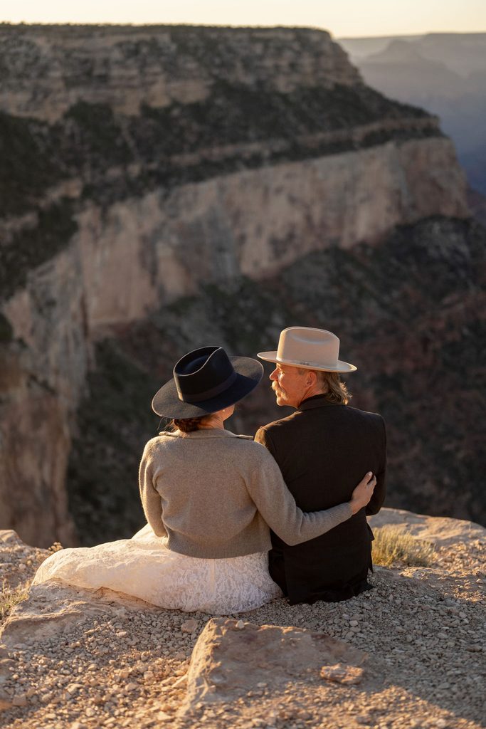 couple sits on overlook