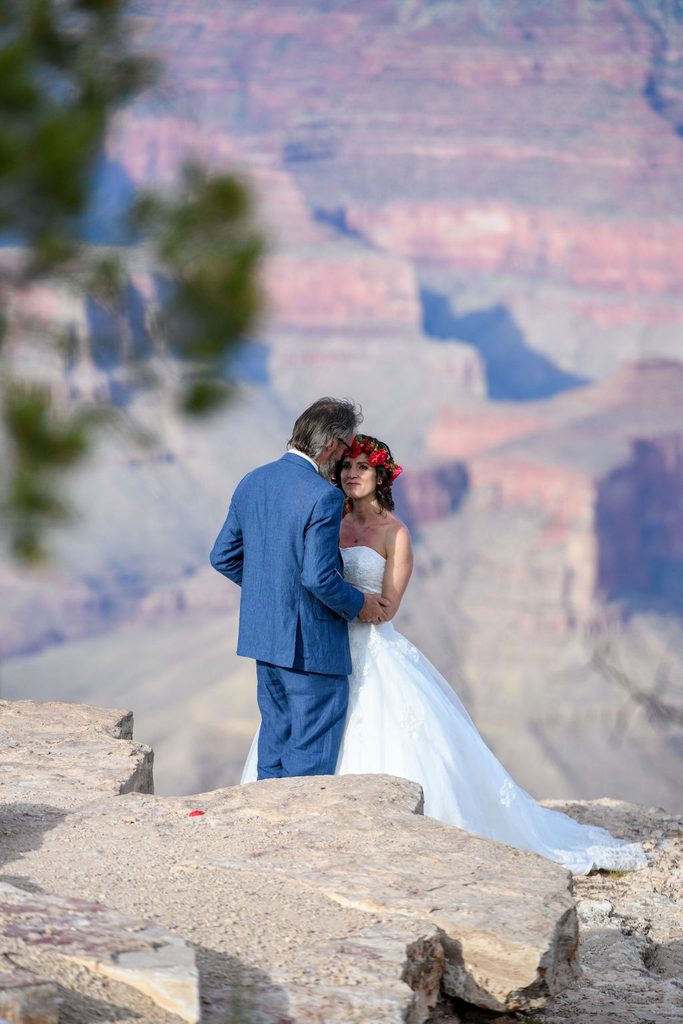 couple embraces at elopement
