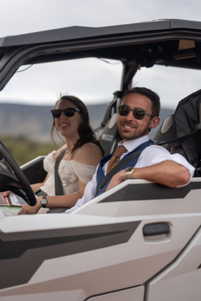 couple pose inside 4x4 after sedona alternative wedding