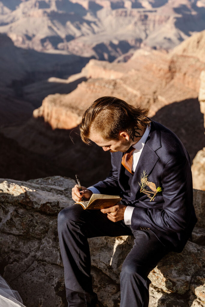 groom writes vows with bride