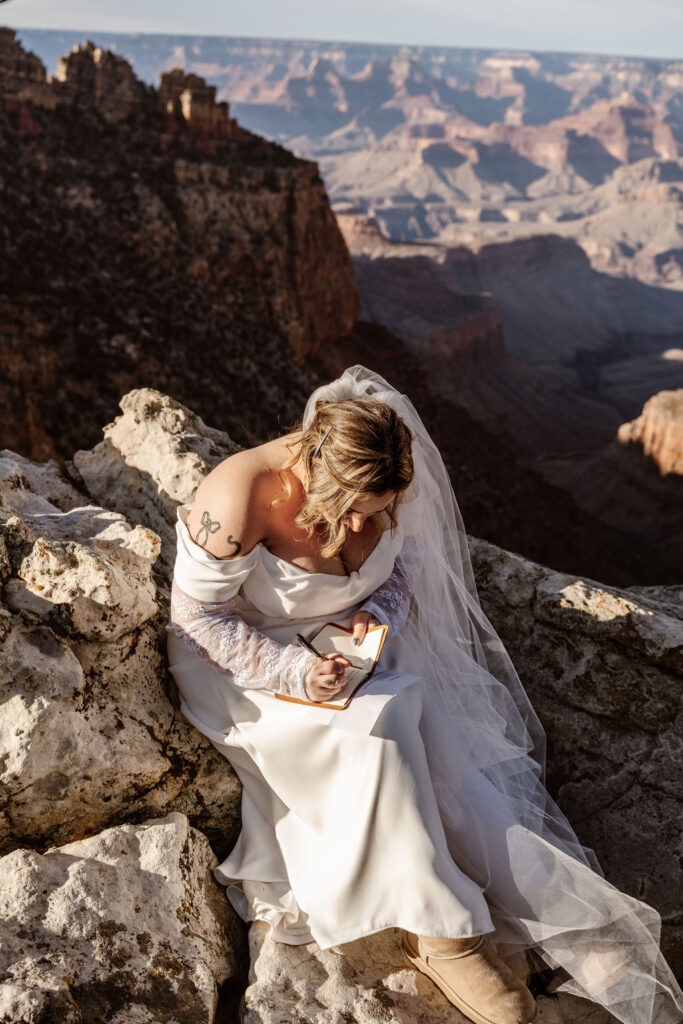 bride writes vows with groom