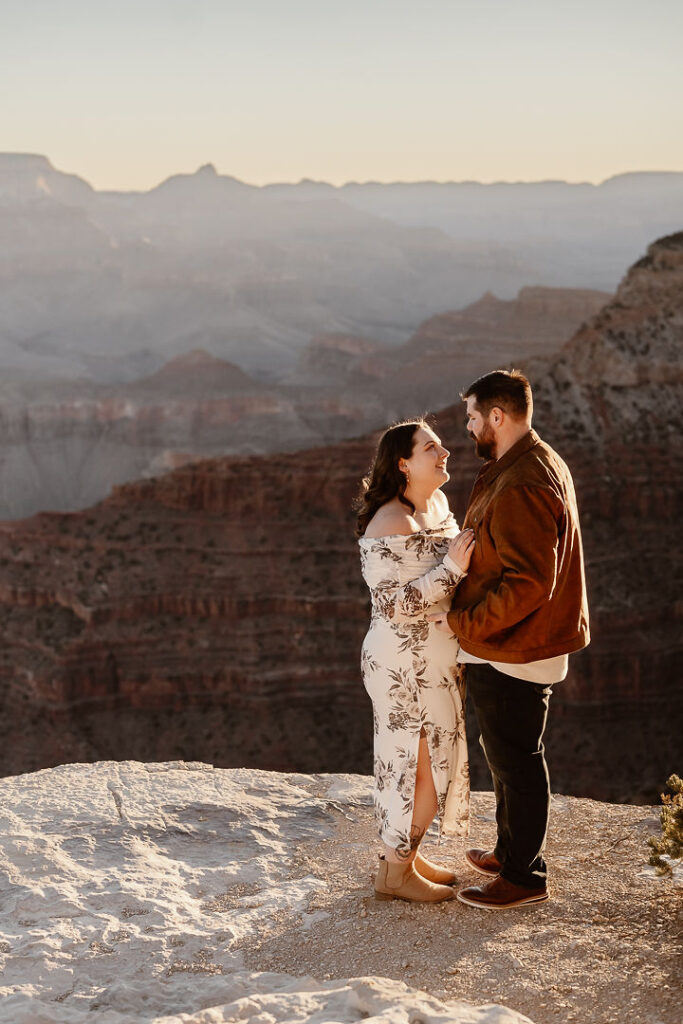 couple poses for Grand Canyon engagement photos
