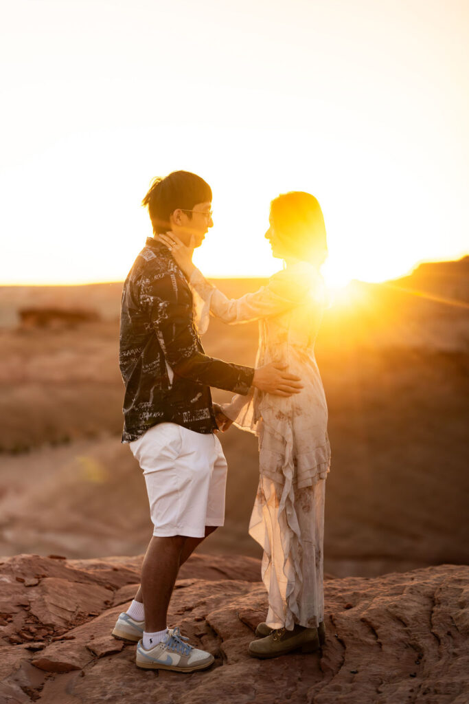 couple embraces at outdoor sunset Arizona engagement