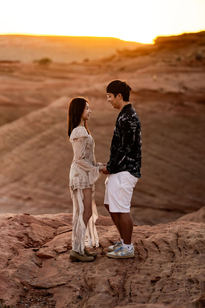 couple embraces at outdoor sunset Arizona engagement
