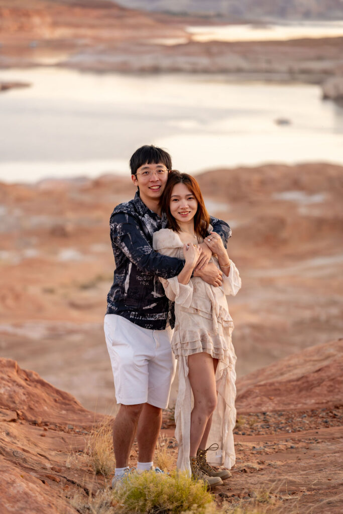 couple embraces at outdoor sunset Arizona engagement