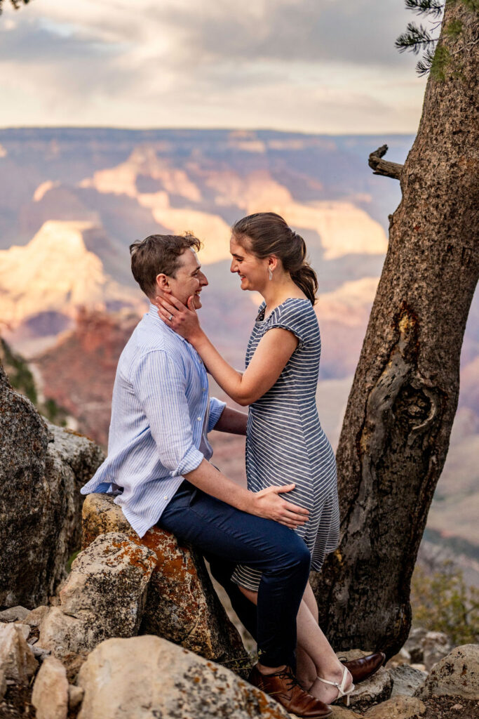 couple holds each other at Grand Canyon engagement session