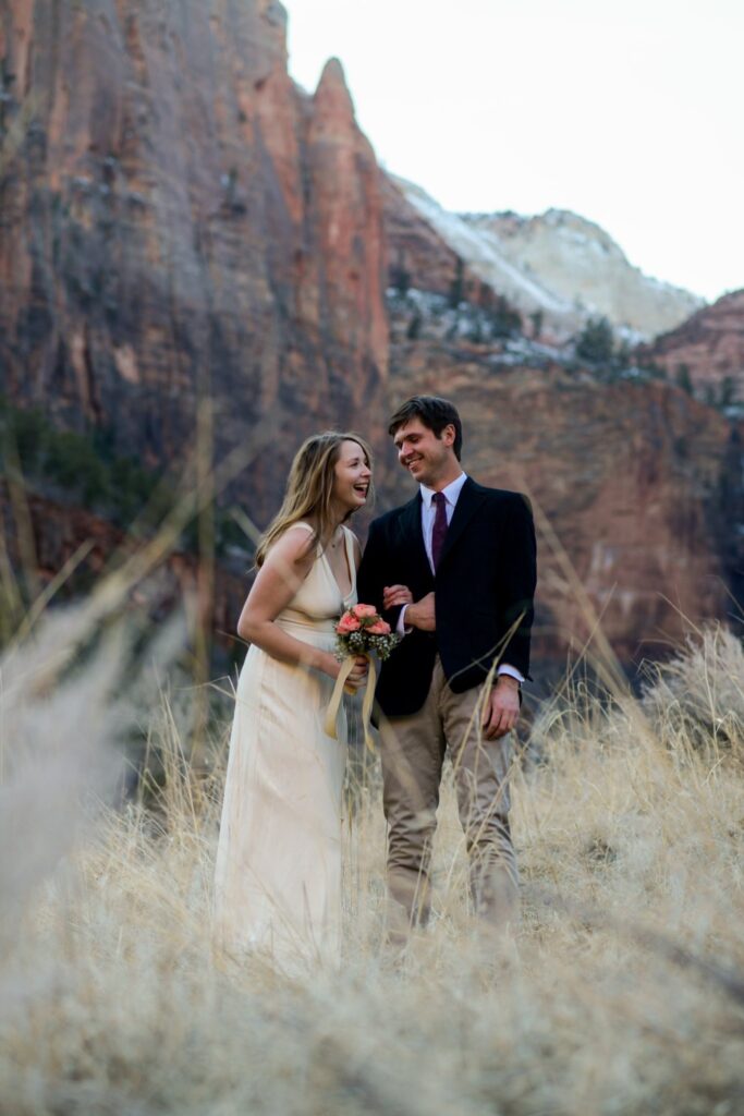 couple embraces at zion national park elopement