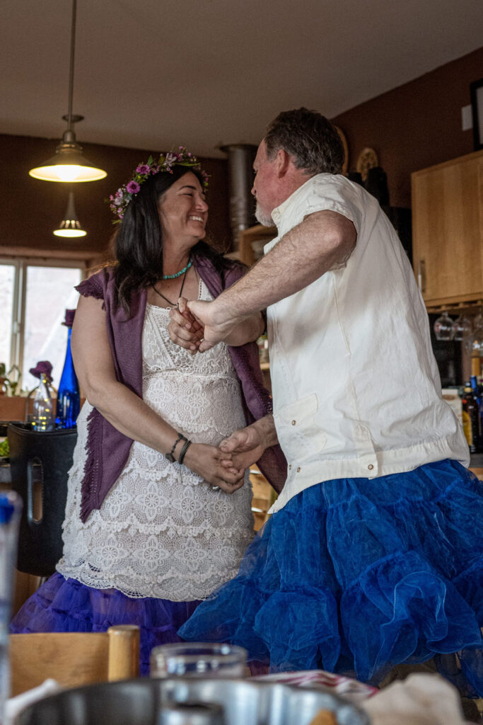 couple does their first dance in tutus