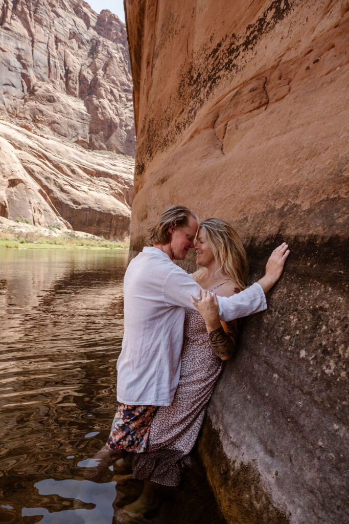 couple poses along Colorado river