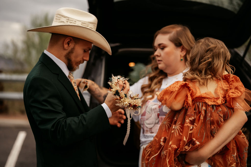 couple getting ready before ceremony