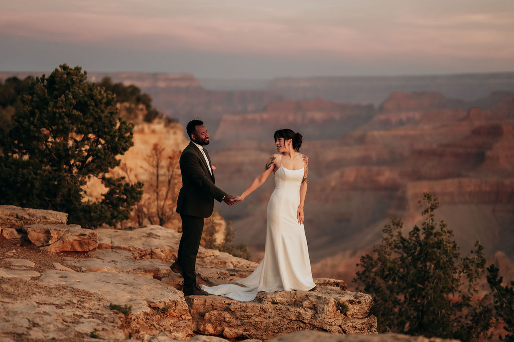 couple portraits during sunrise captured by adventure elopement photographer