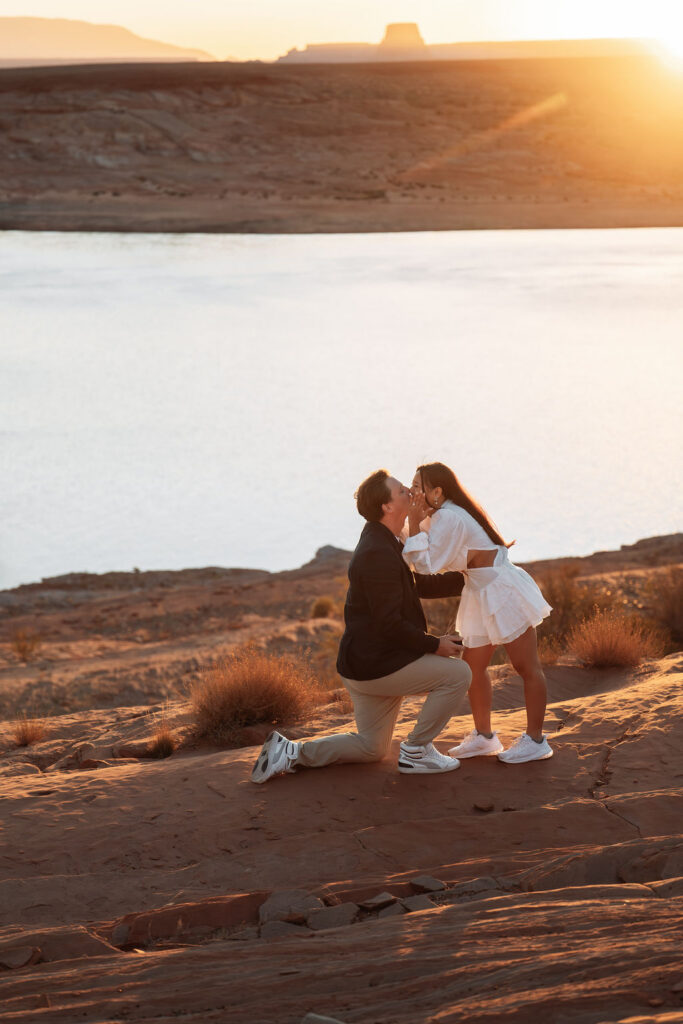 couple kiss after surprise proposal