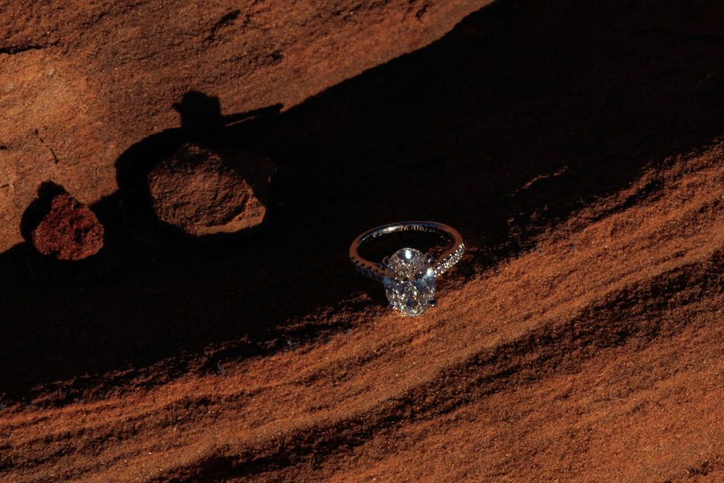 engagement ring on the red sand