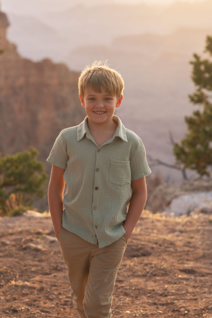 child posing at the Grand Canyon