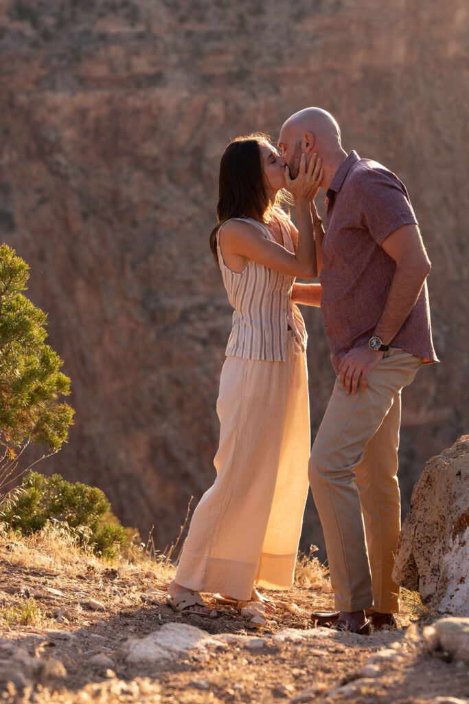 couple kiss after surprise proposal