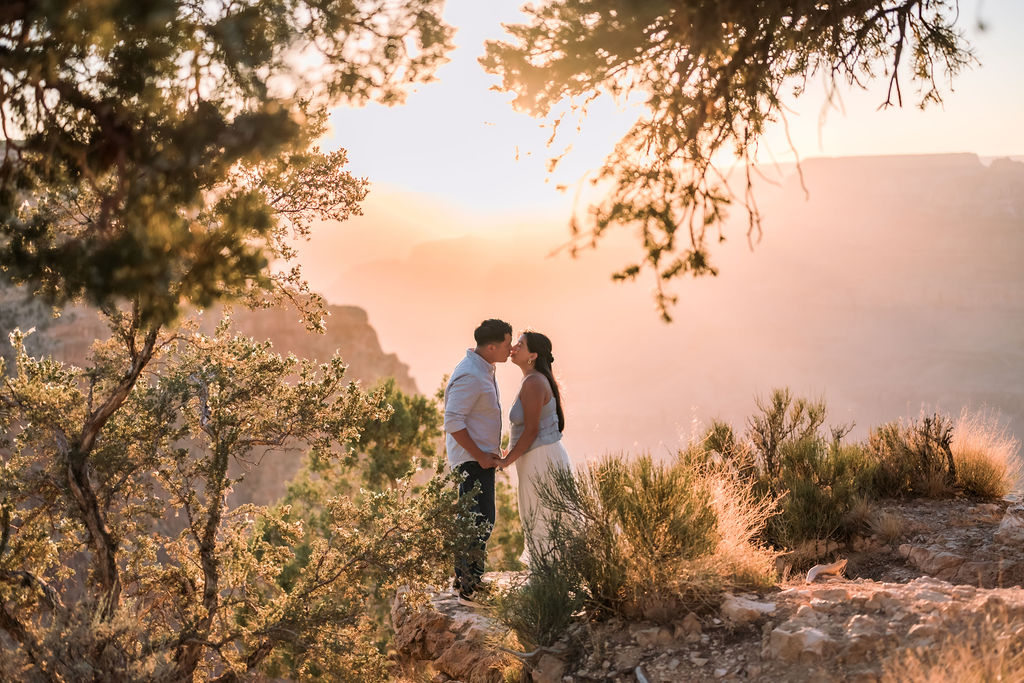couple kiss during sunset at the Grand Canyon