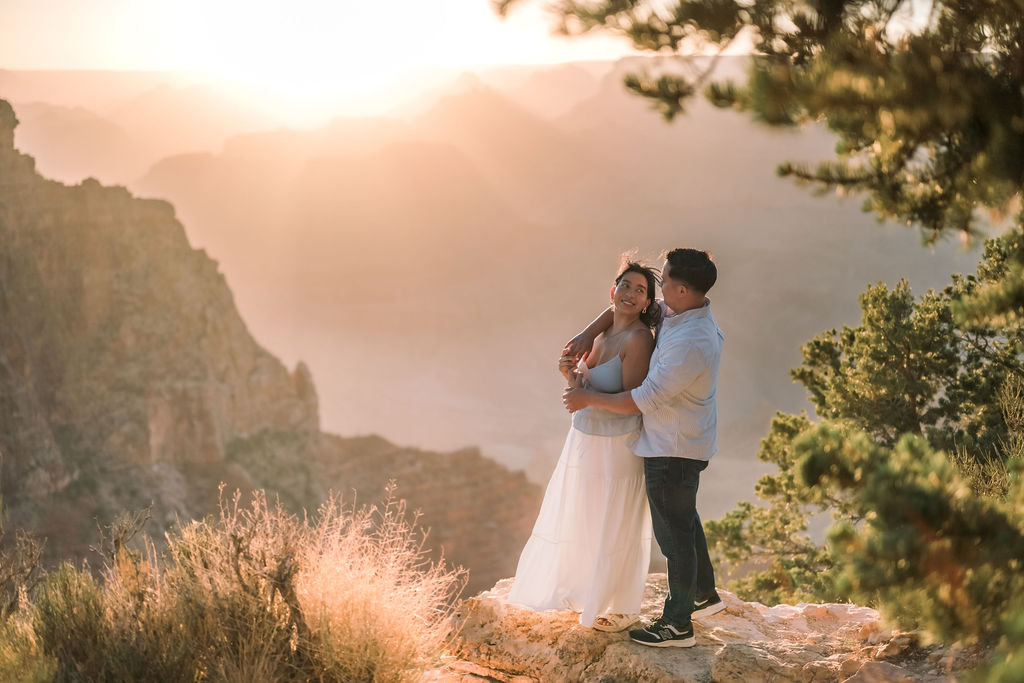 couple embrace at sunset