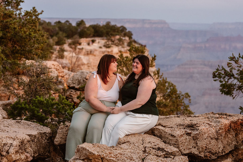 couple sits on overlook