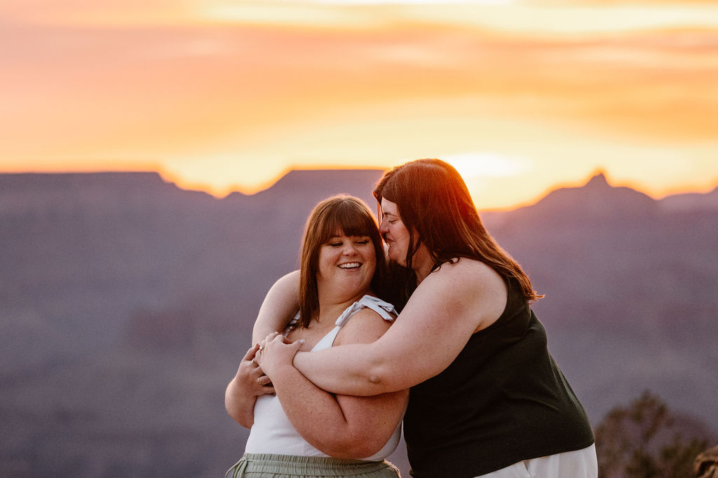 couple embraces at sunrise