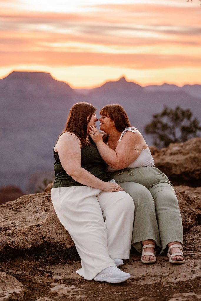 couple embraces on sunrise overlook